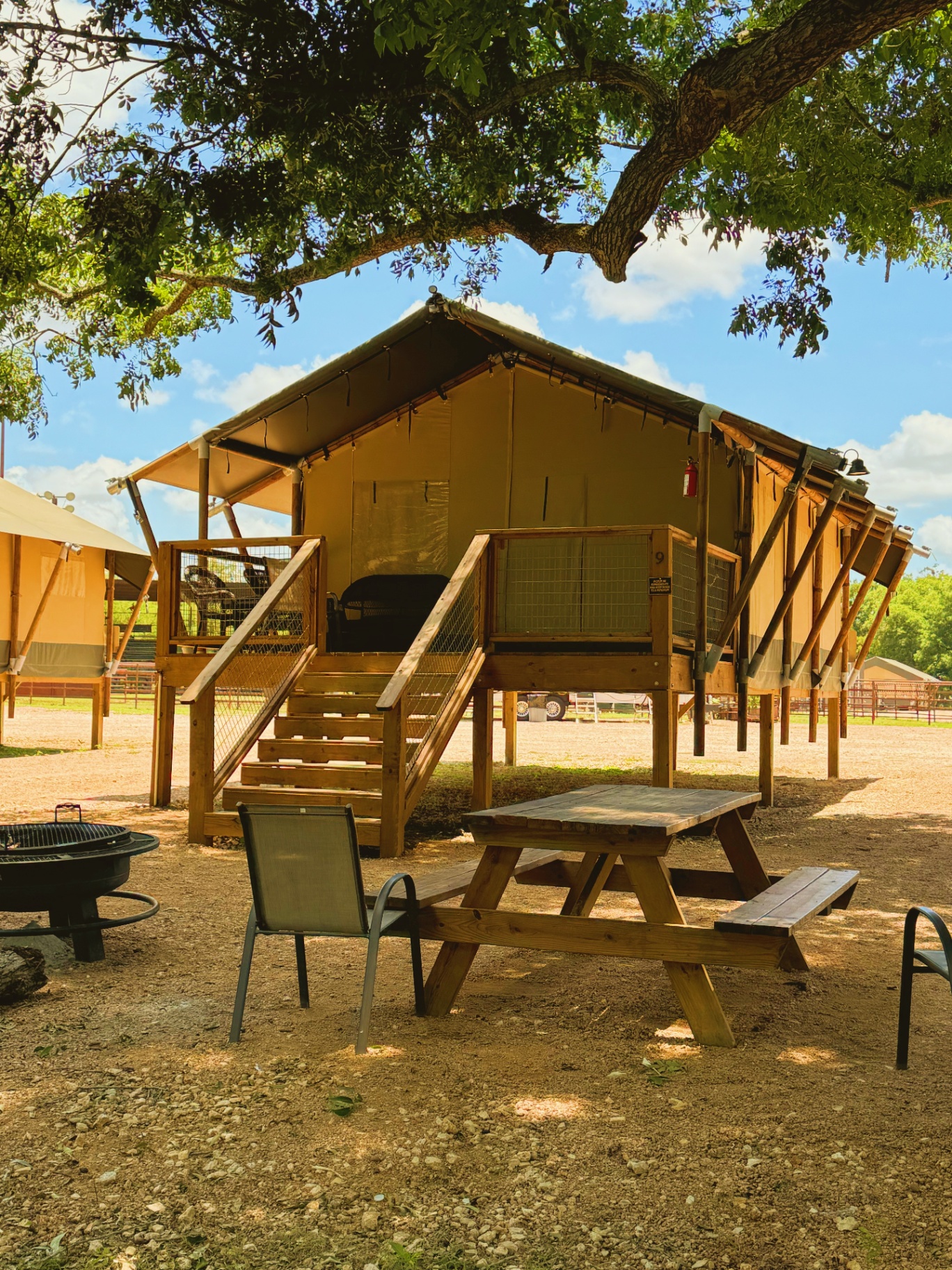 Glamping cabin at Son's River Ranch surrounded by trees