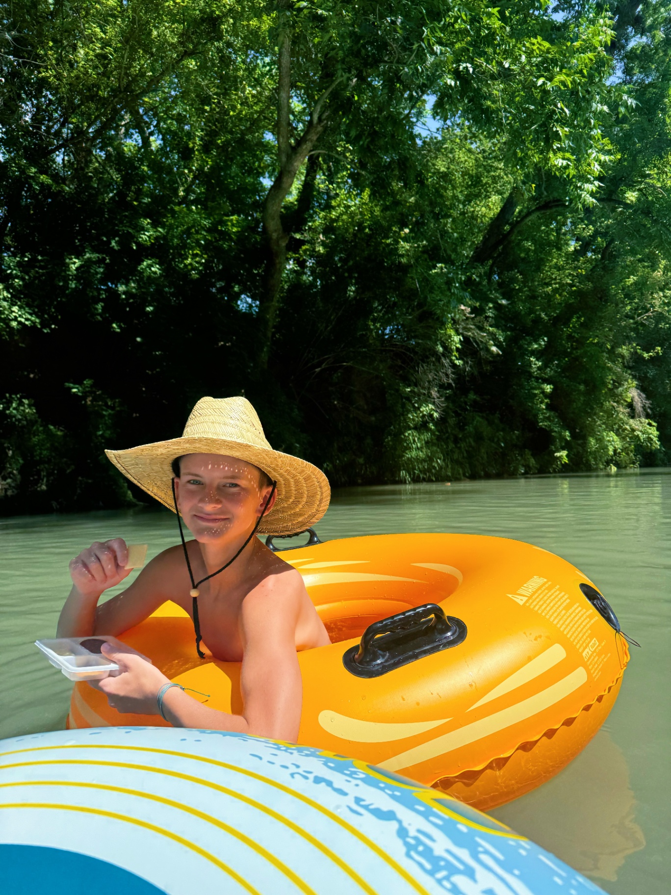 Family tubing on the San Marcos River during Spring Break