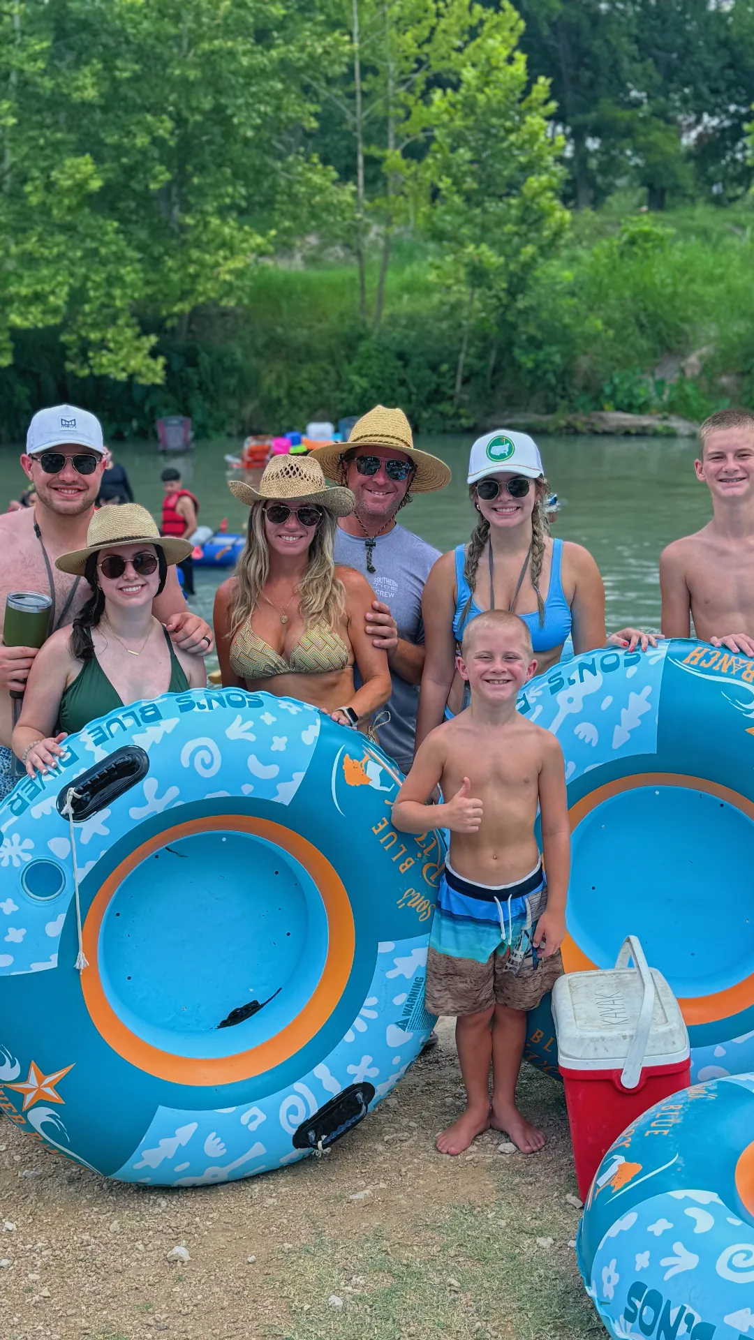 Family enjoying tubing on the San Marcos River