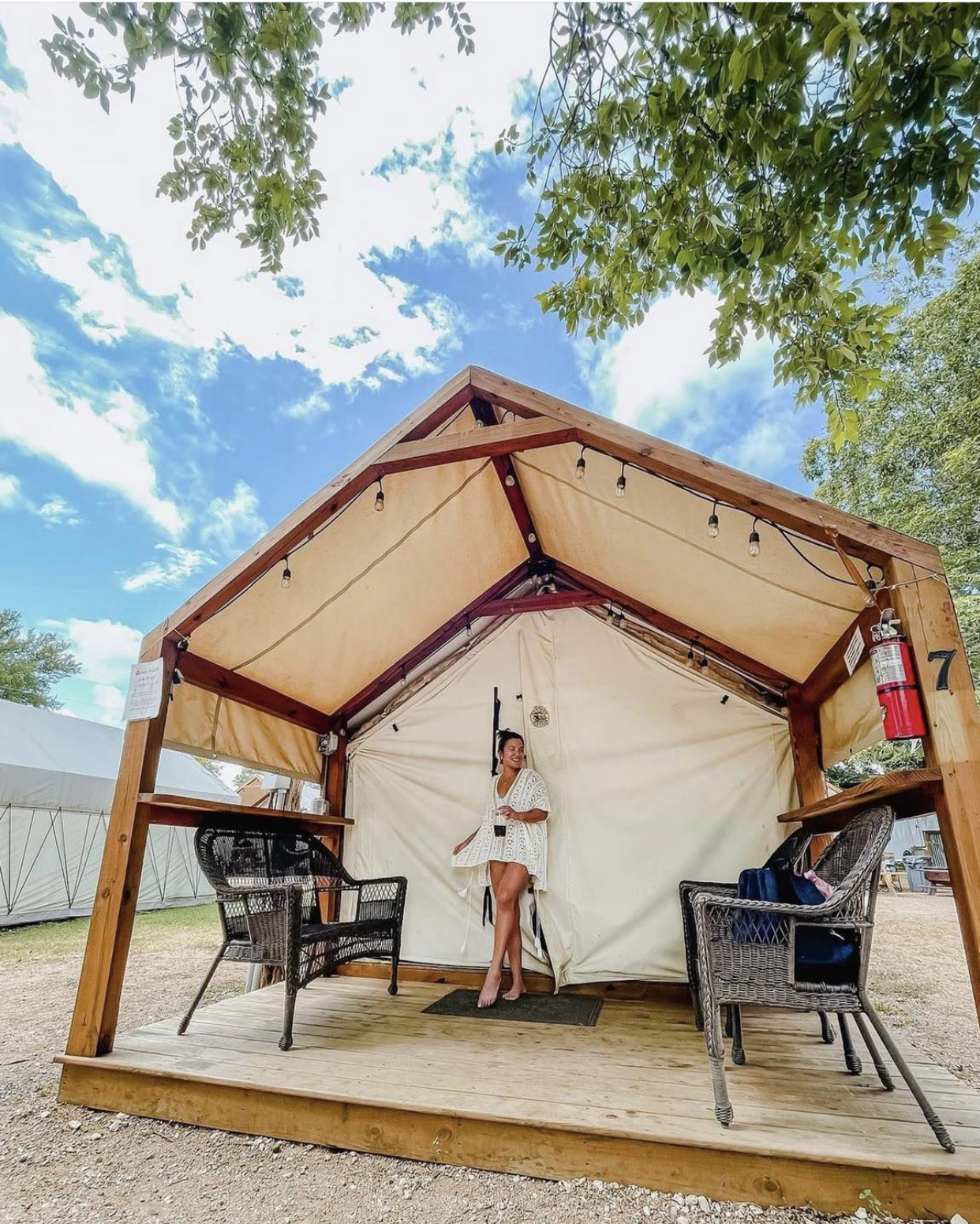 Guest at Glamping Cabin entrance