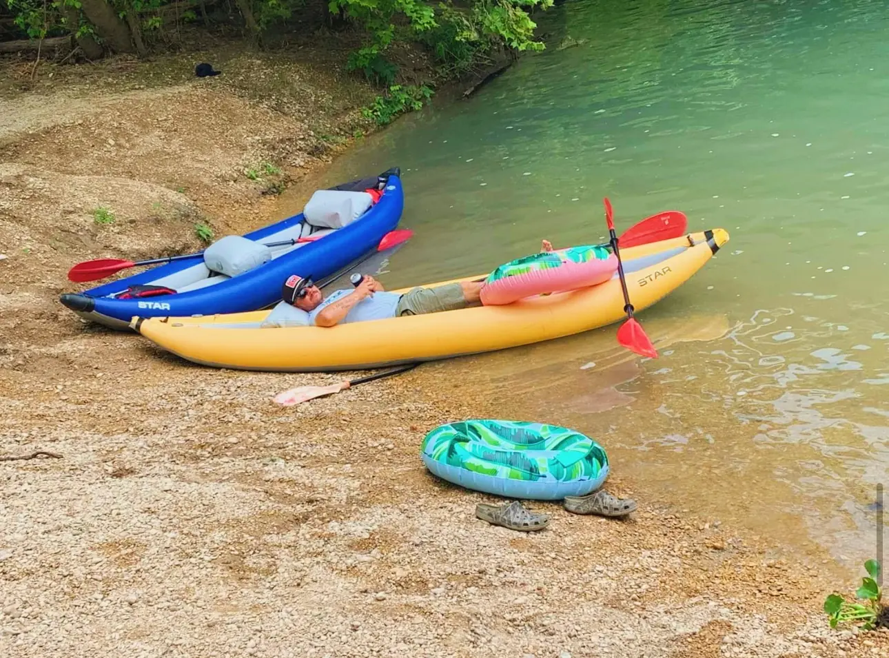 kayak-beached-riverbank.webp