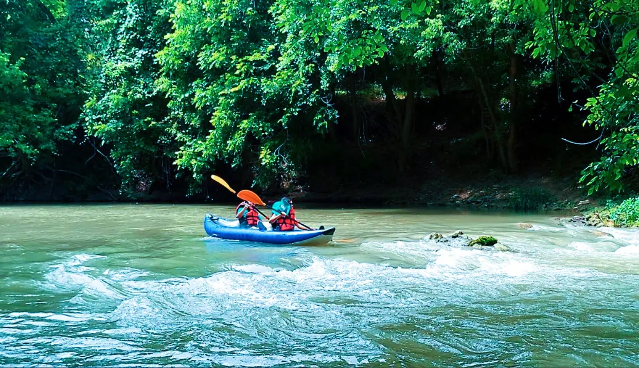 kayak-rapids-river.webp
