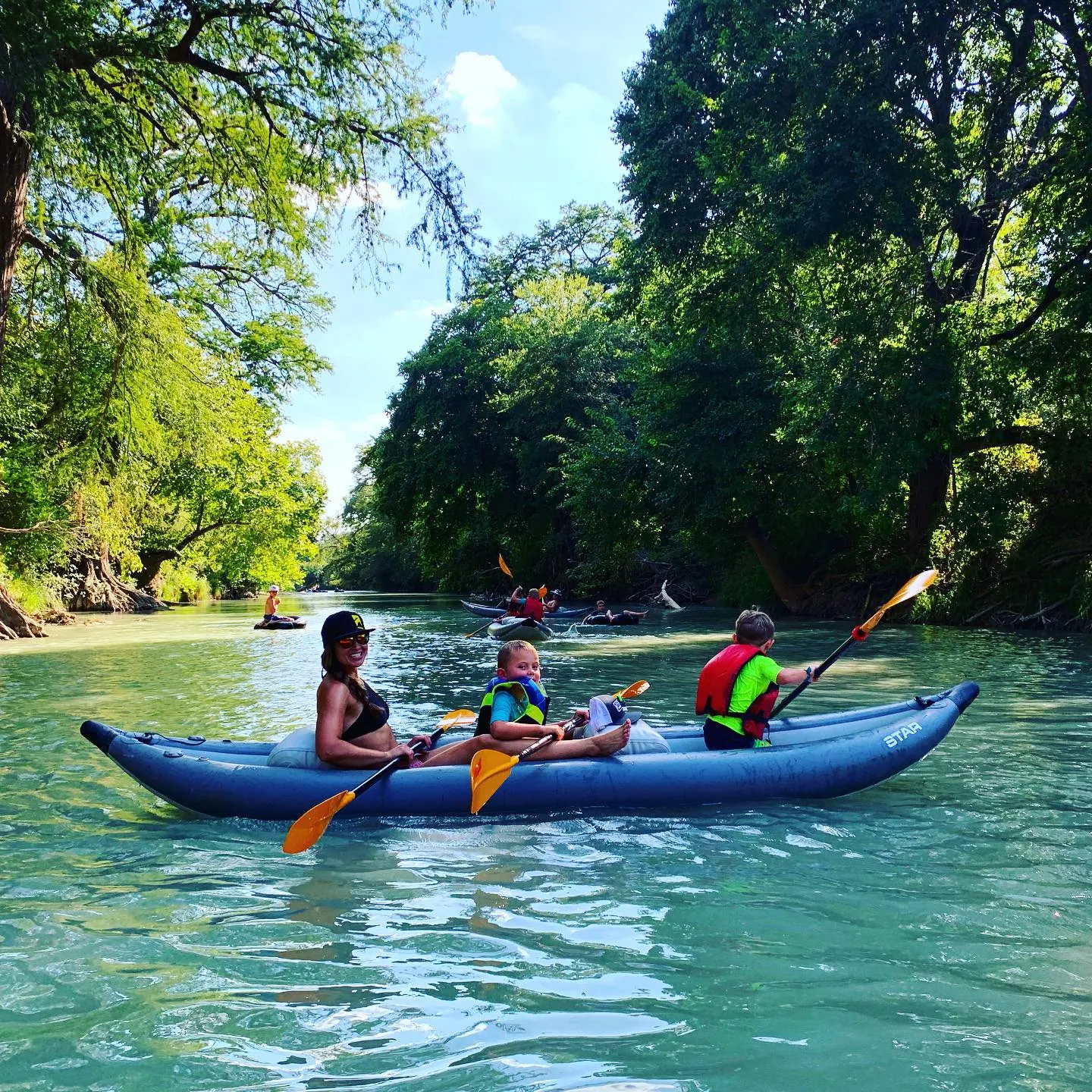 Family kayaking on the San Marcos River