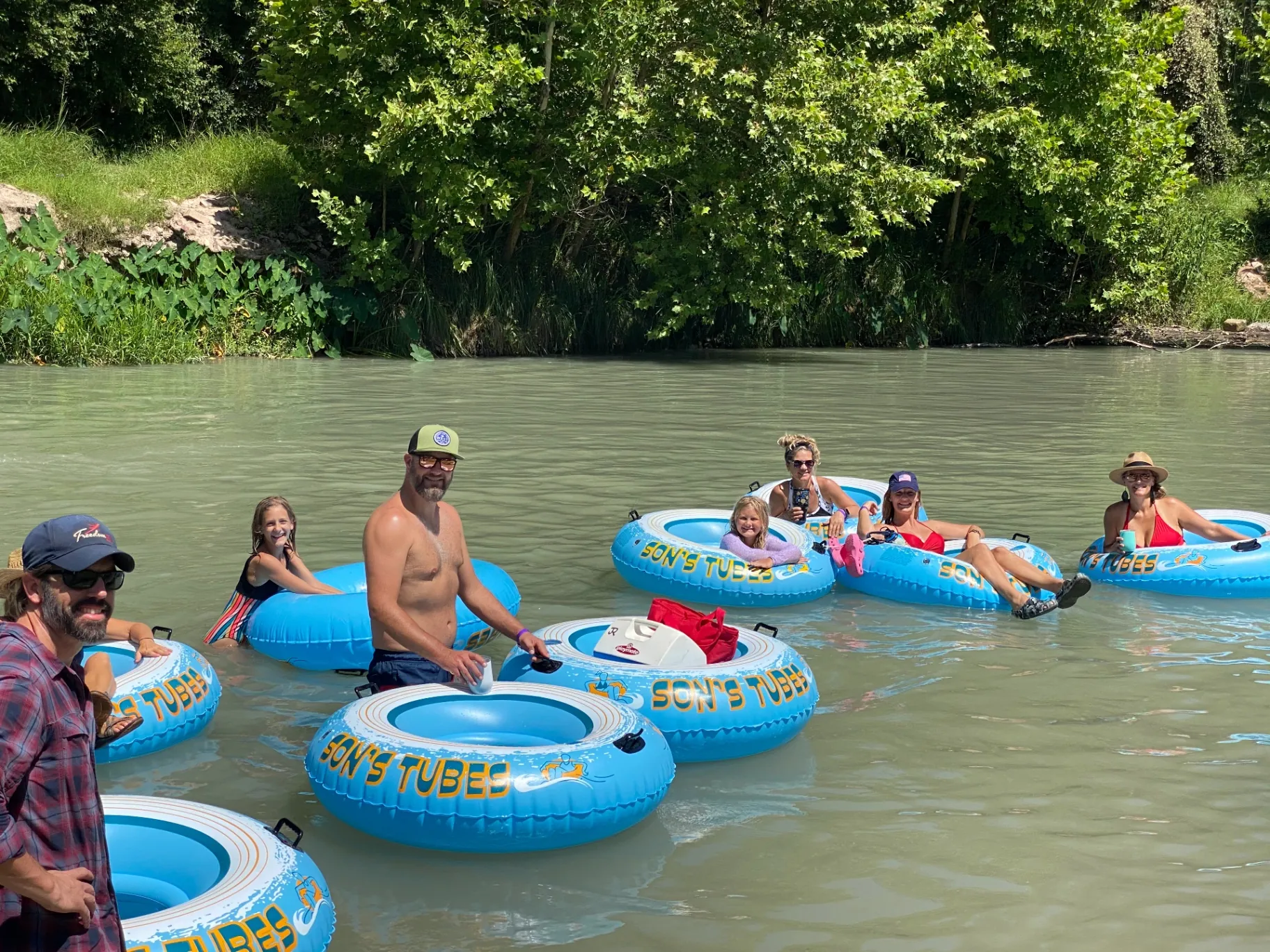 Family tubing on the San Marcos River near Austin at Son's River Ranch