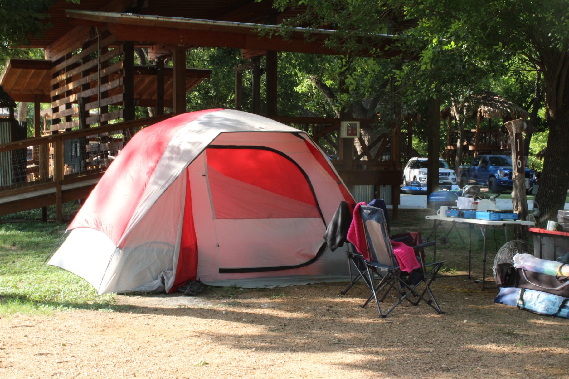 Red tent near cabana structure
