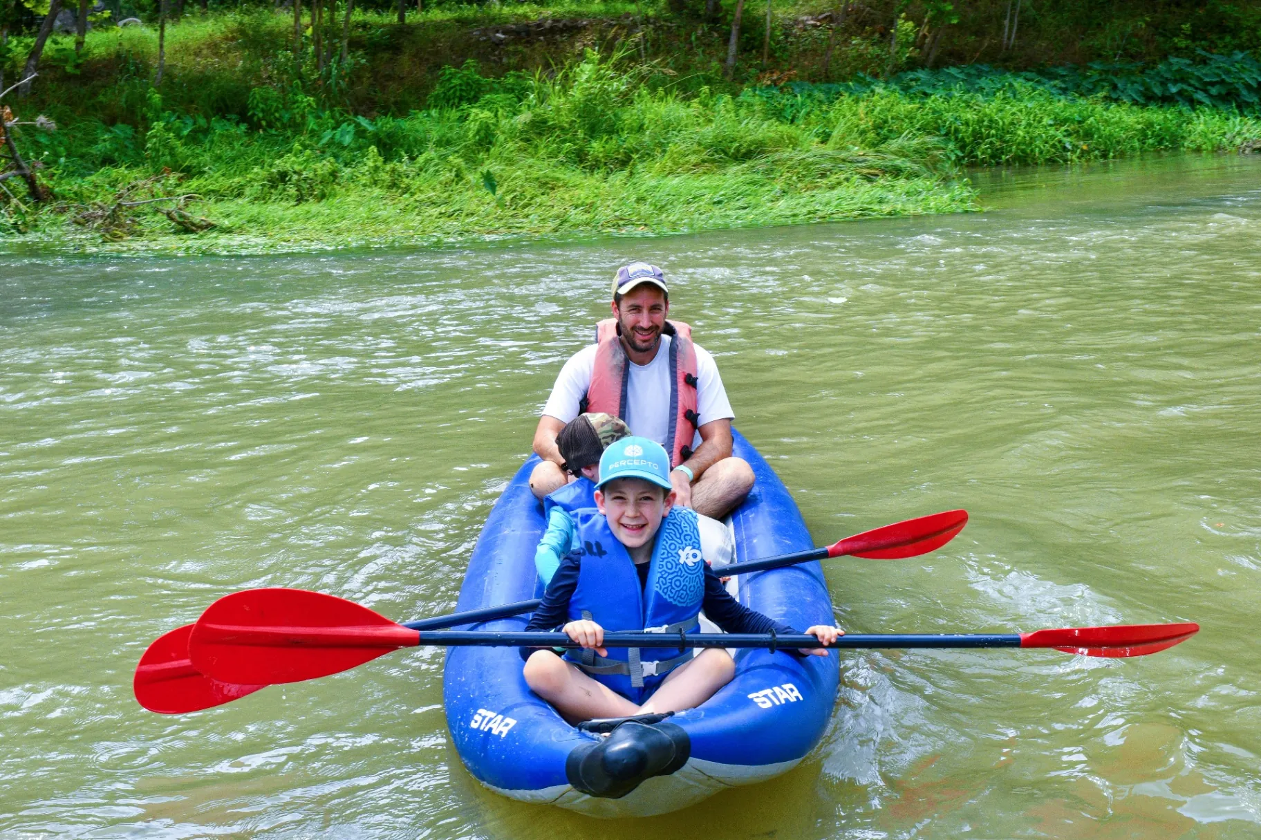 Family kayaking on the San Marcos River